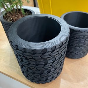 Offroad Tire Pot // A stack of tires flower planter that looks like a cute stack of 4 off-road tires
